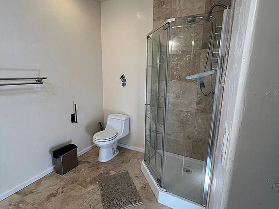 Travertine flooring and bathroom