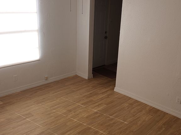 Living room, entrance to Kitchen