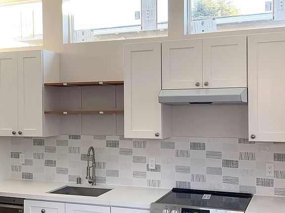 Beautiful new kitchen with skylights and windows