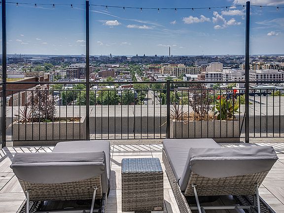 Rooftop deck with lounge chairs