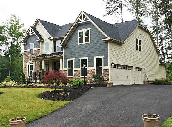 Side 3 car garage entrance view