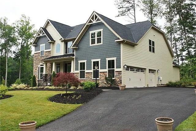 Side 3 car garage entrance view