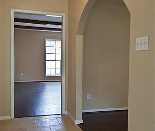 Stepping into the foyer, you get a glimpse of the many updates just completed including new flooring