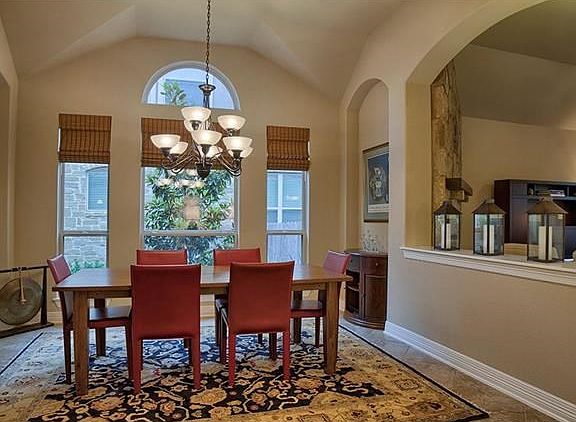Fabulous formal dining area with high ceiling