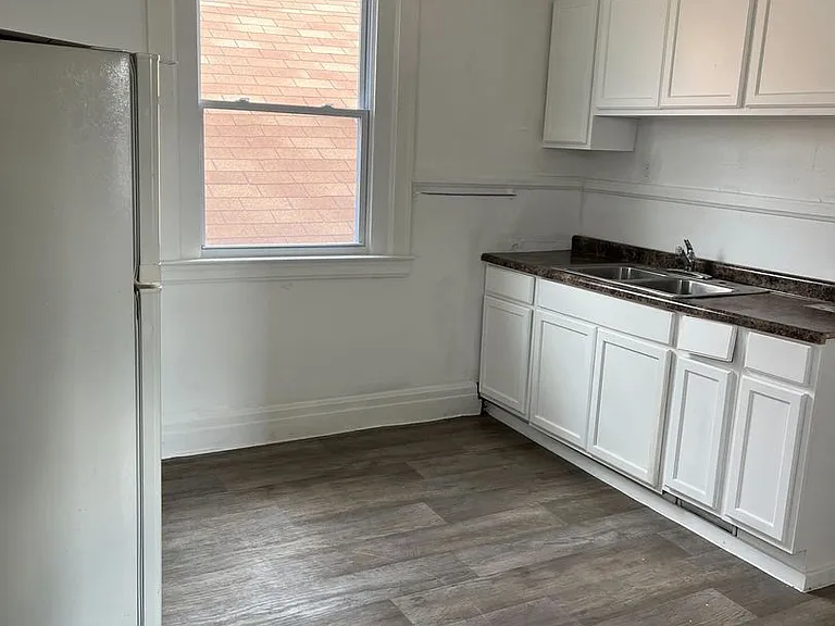 6307/6311 Woodrow - Paralev LLC — Photo 9