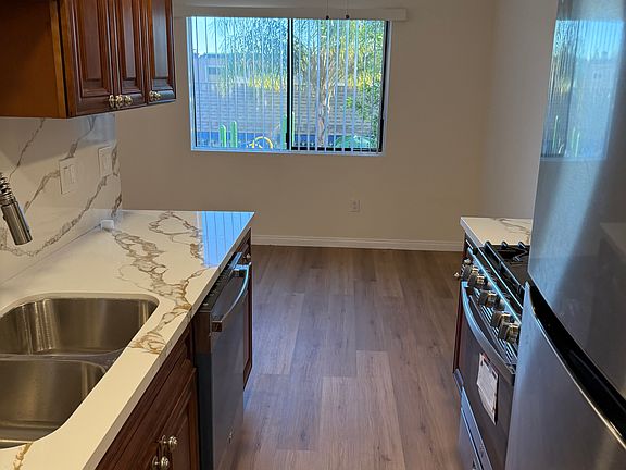 2nd image of 9047 Langdon Ave Unit 39