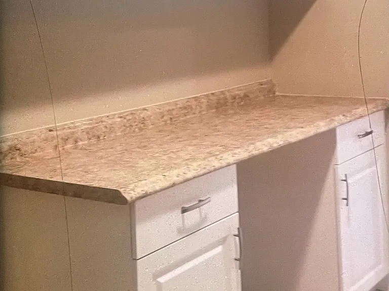 Interior Laundry Room: desk work-space & storage: extra "flex room" off the garage..under A/C.