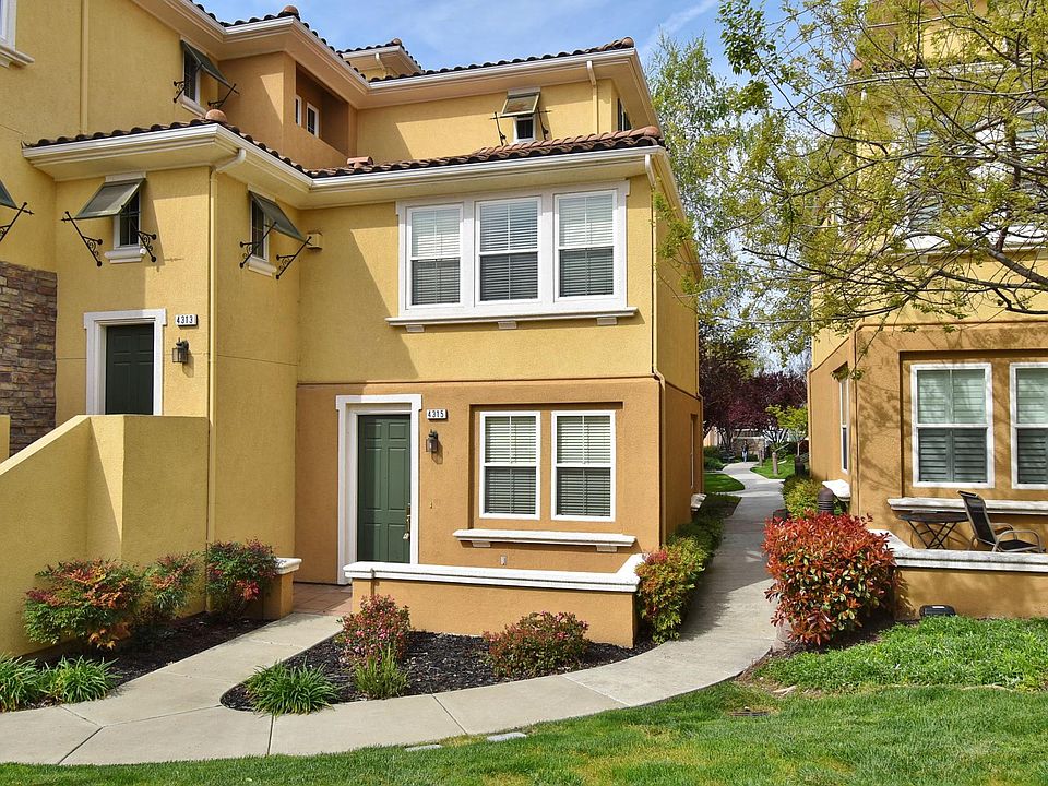 Ground Floor entrance, front porch, corner unit, front door is east facing.