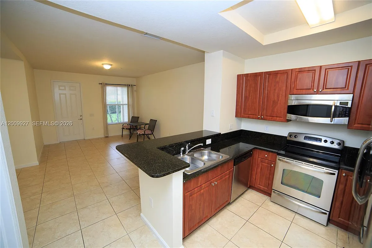 Building Photo - 4501 Mimosa Ter #1409