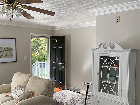 Living Room with entrance door.