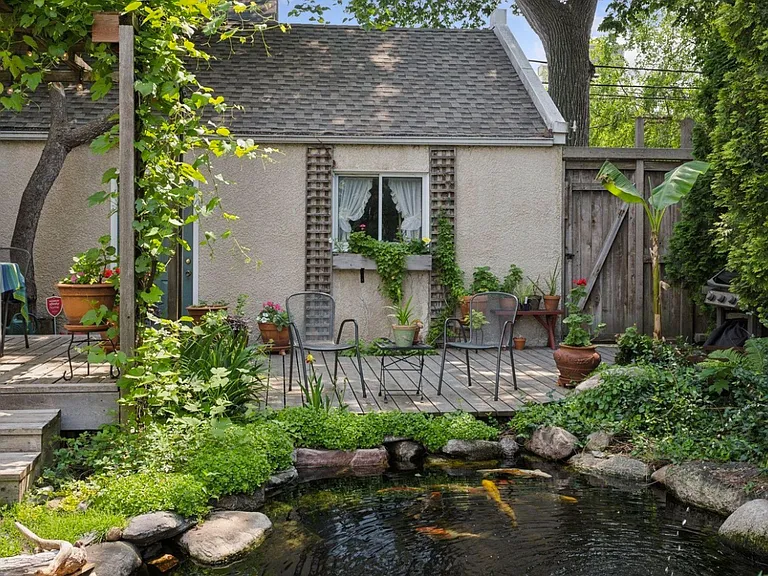 A view capturing our oasis, but also the garage you'd be parking in for free! Very secluded yard, locked back gate, locked front gate. Garage has automatic lights, and entry includes garage opener and/or keyed entry.