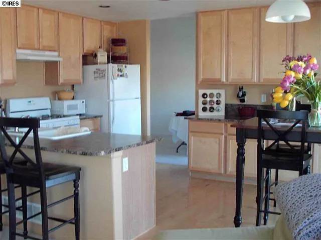 Maple Cab and Flooring Pantry Cabinets