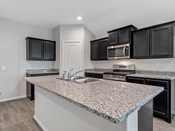 All photos shown here may not depict the specified home & features included are for illustration purposes only
