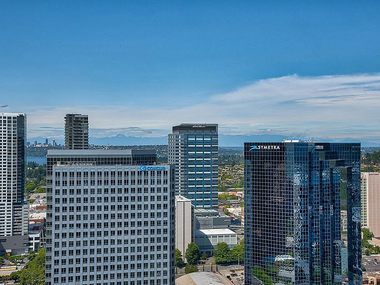 Skyline, mountain and water views meet when viewed from this Pacific Northwest penthouse terrace, unit 3102 at The Bravern