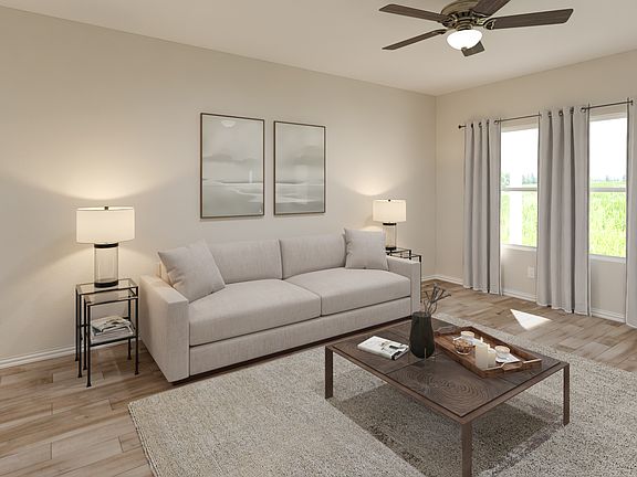 Kick your feet up after a long day in your cozy living space.