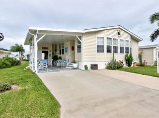 930 Frangi Pani Dr, Barefoot Bay, FL 32976