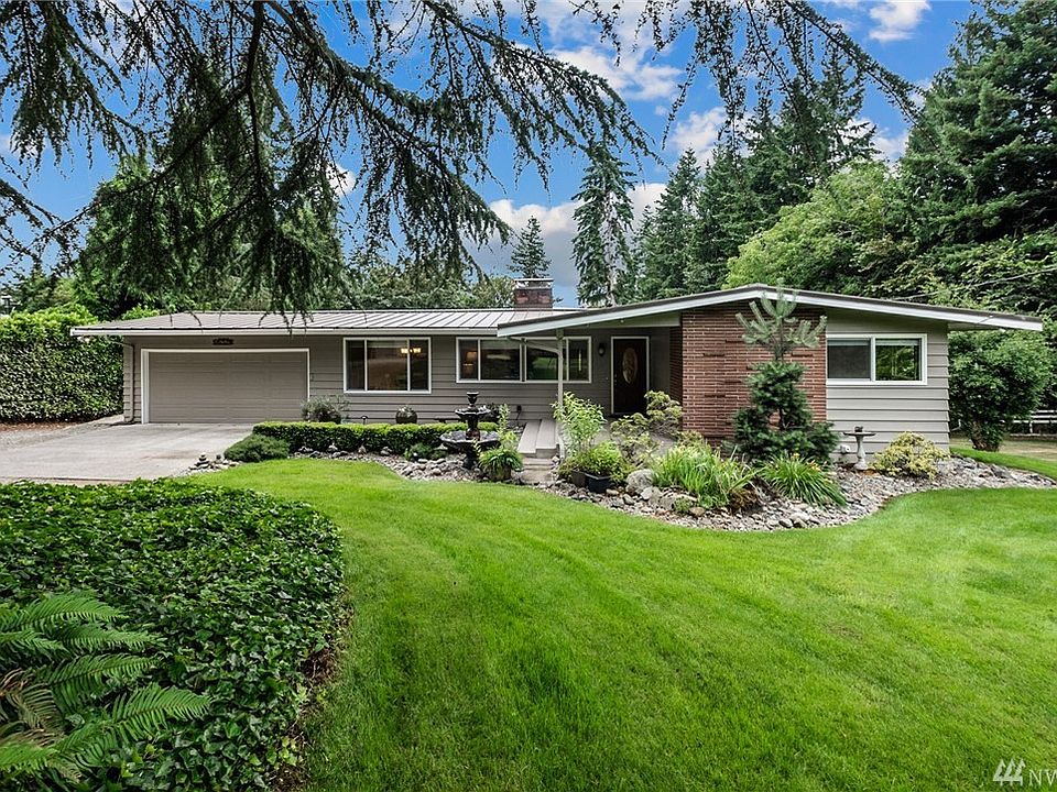 Welcome home to this picture-perfect one-story with basement on its private 2 acres!