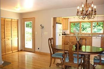 Look at all this dining room space with large pantry or storage closet and access door to the deck.