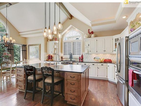 Dream Kitchen w/ custom island, granite tops & stunning pillowed tile backsplash