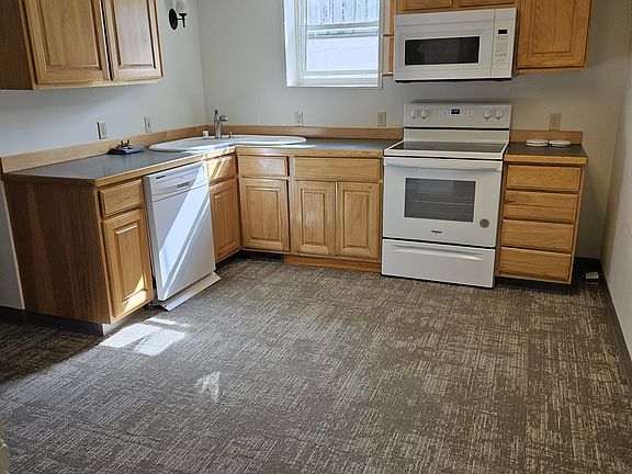 Spacious kitchen, storage, full size dishwasher, microwave and room for a cafe table/ casual eating space.