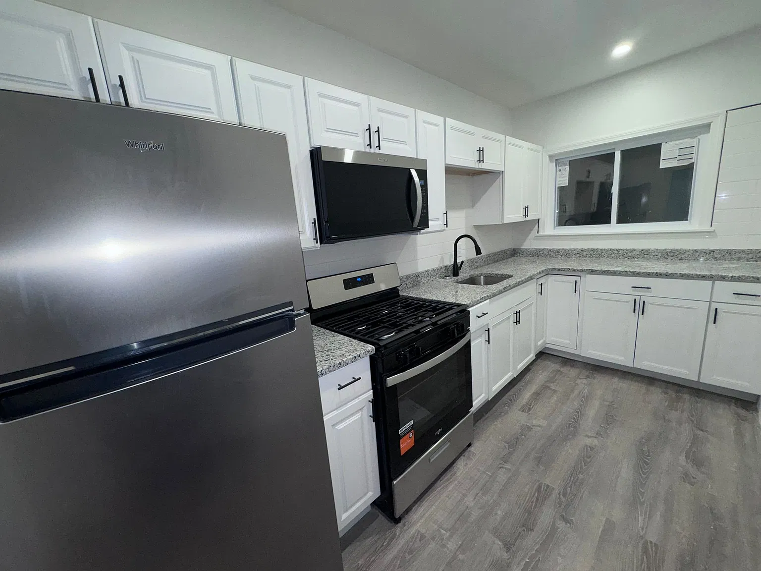 Recently Renovated 4BR/1BA with New Appliances & Parking Available Oct 26! — Photo 3