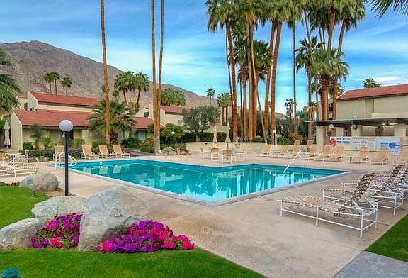 Stunning pool area with BBQ and covered gathering area
