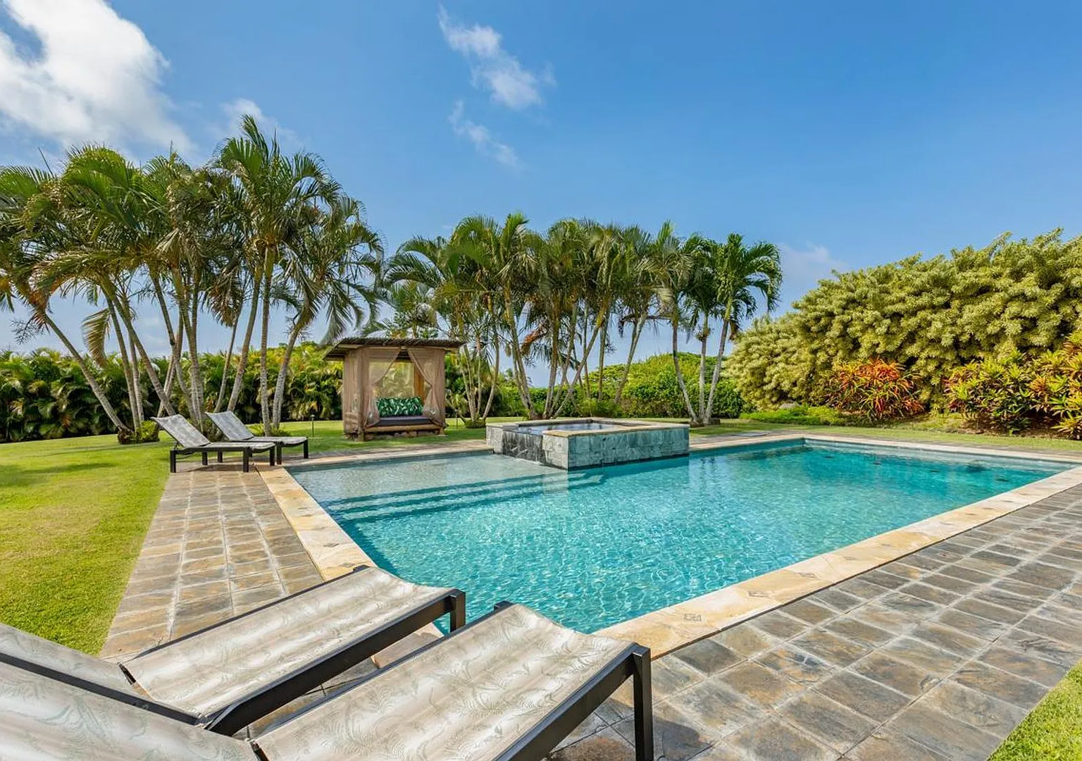 Private North Shore Oasis: Unique Pod-Style Estate with Zero-Edge Pool & Ocean View — Photo 1