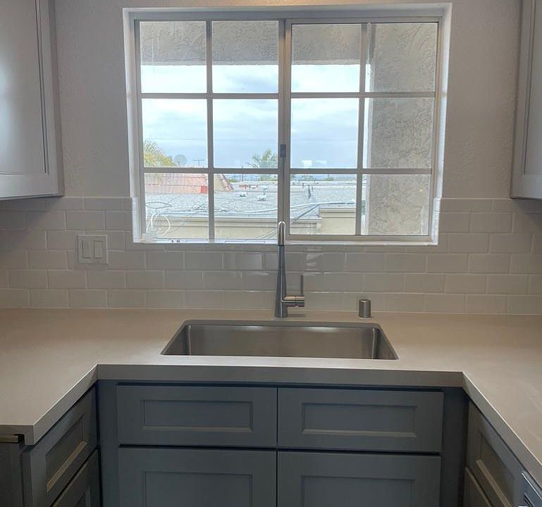 New kitchen cabinets, quartz counterops, new appliances.