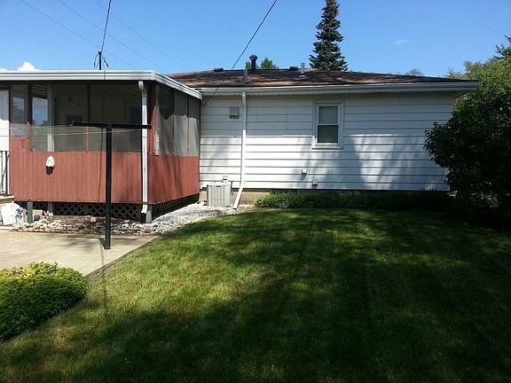 Long back yard with porch