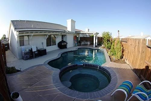 Backyard with refinished concrete.