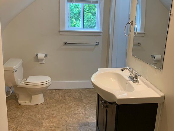 Bathroom with washer/dryer hookups, shower only (no tub)