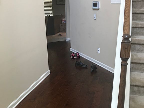 Foyer with hardwood floors