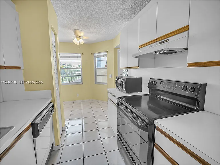 12701 SW 13th St #202F — Photo 11