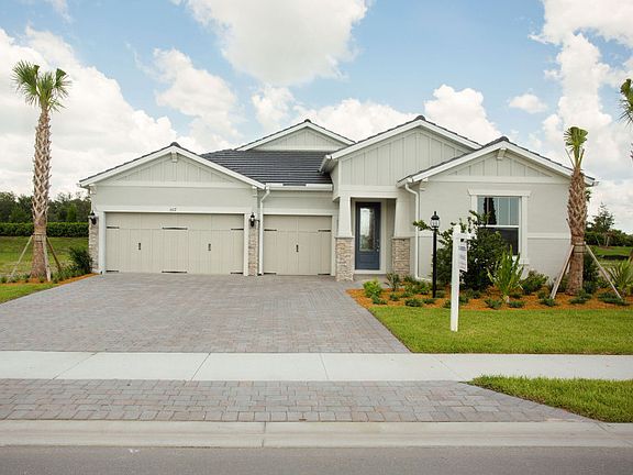 Creekview exterior with 3-car garage