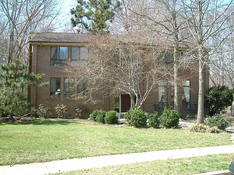 Front of the home with sidewalk