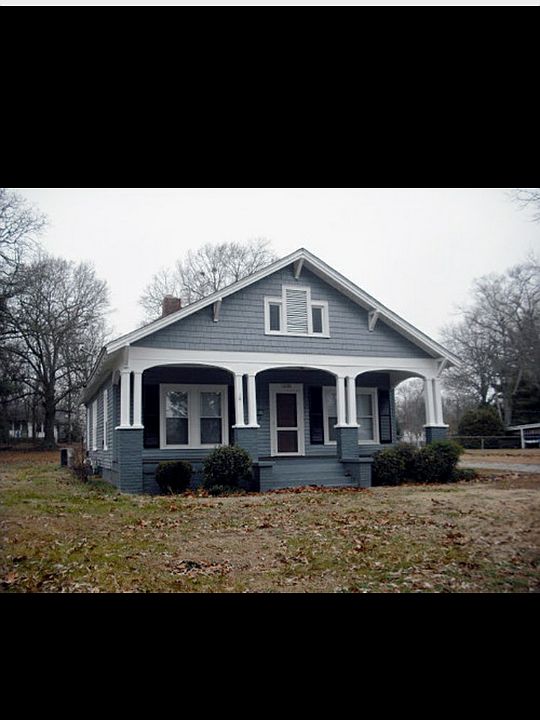 Front of house with covered porch