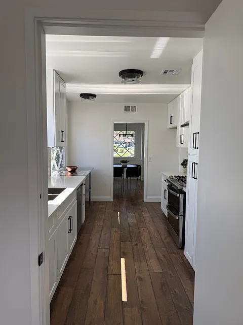 view from laundry room looking through kitchen to dining room - 1424 Riverside Dr