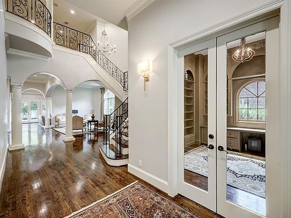Hardowood floor and high ceiling, beautiful French iron stair case