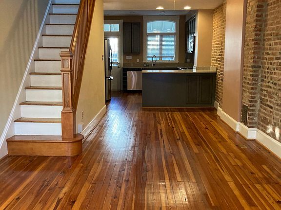 Looking from Front of Living Room Toward Kitchen and Stairs to 2nd Floor