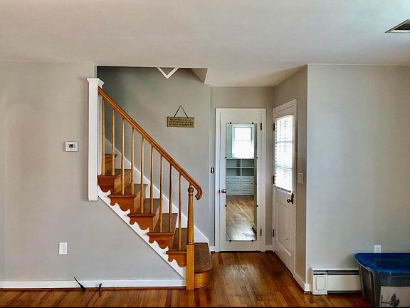Stairs leading to the 2nd floor where there is a newly refinished attic