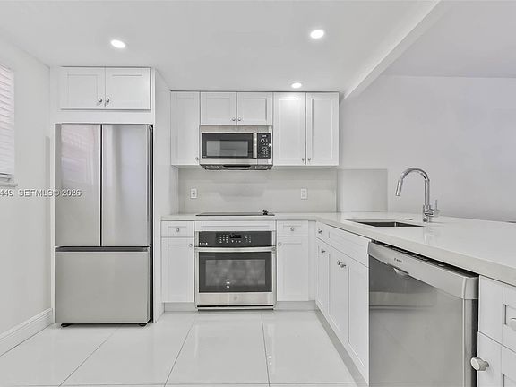 2nd image of 100 Edgewater Dr APT 204