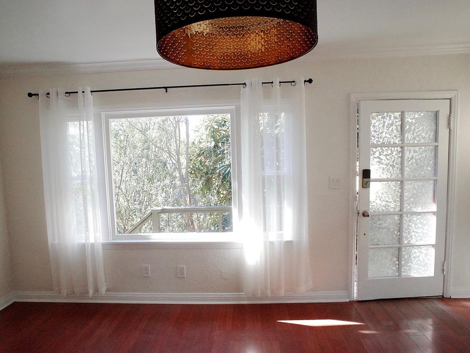 bright living room looking out on private garden
