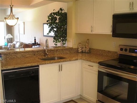 The large open pass through to the great room is perfect when entertaining.