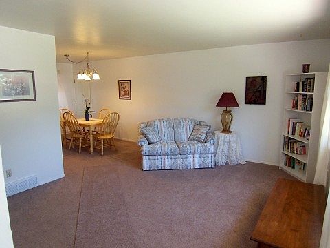 Living Room Opens to Formal Dining Room...