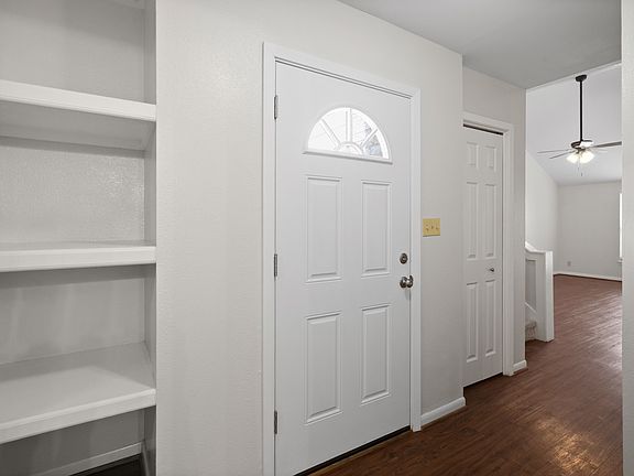 Foyer w coat closet and shelving