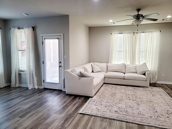 Dining area on the side, leads to screened in back patio