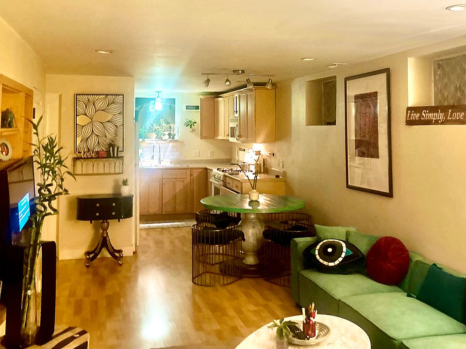 Looking North in living room toward kitchen.