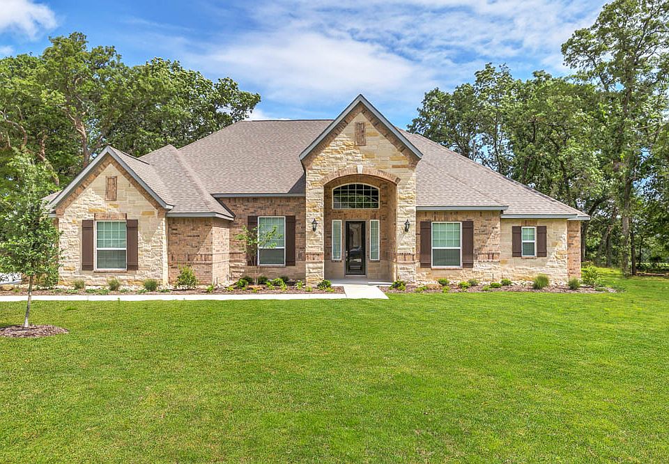 The stunning stone exterior welcomes you into this functional and elegantly designed home.