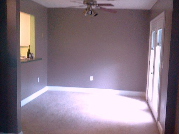 Dining area with double doors with adjustable enclosed blind