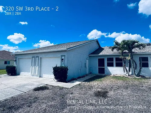 320 SW 3rd Pl Photo 1